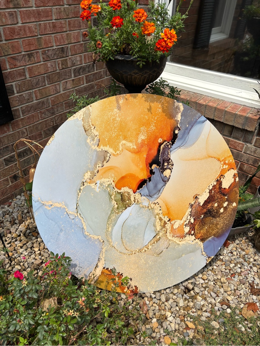 Abstract Round Wall Art in Orange, Blue, and Gold